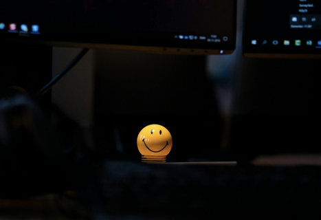 smiley face ball in black backgroud