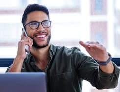 shot-of-a-young-businessman-talking-on-a-cellphone-2023-11-27-05-20-49-utc